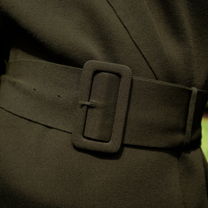 front image of a woman wearing the yuwei jardigan in dark elm