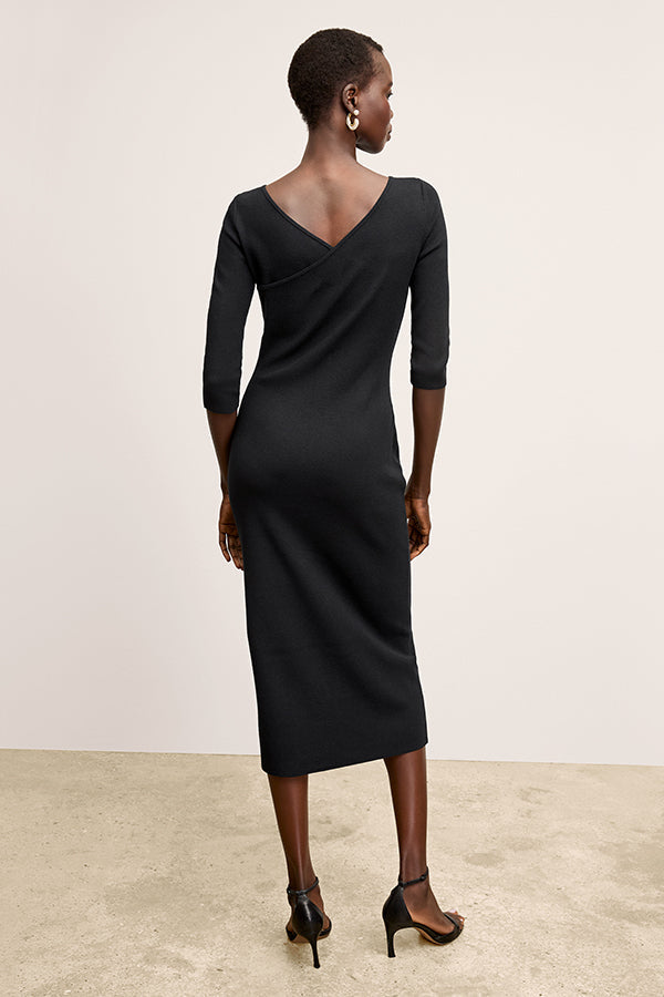Back image of a woman wearing the Zana Dress in Black | Exclude