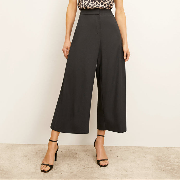 Front image of a woman wearing the Zhou Culotte - Eco Heavy Soft Wave :: Black | Lead