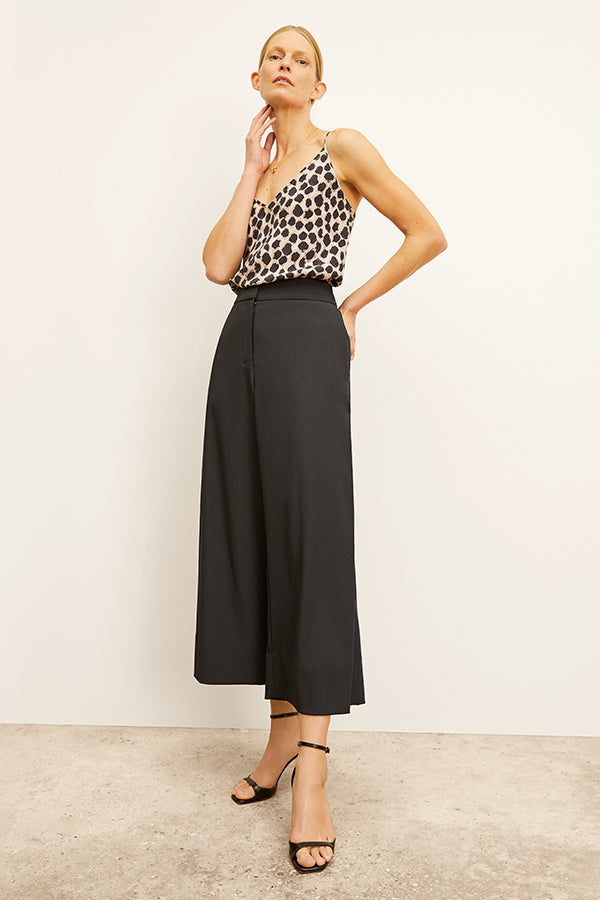 Front image of a woman wearing the Zhou Culotte - Eco Heavy Soft Wave :: Black | Grid | Exclude