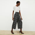 front image of a woman wearing the zhou culotte in symphony print | Lead