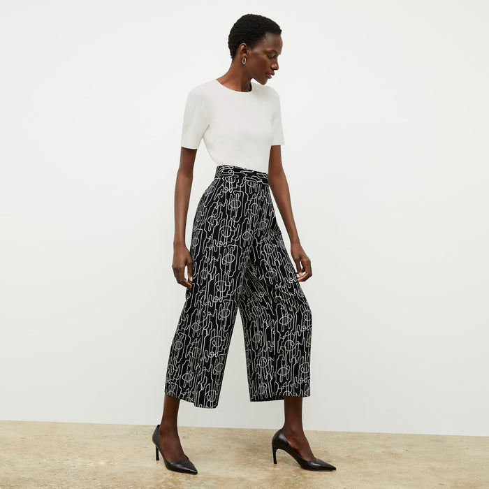 front image of a woman wearing the zhou culotte in symphony print | Lead