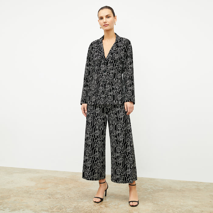 front image of a woman wearing the zhou culotte in symphony print