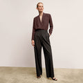 front image of a woman wearing the zuri pant in black | Lead